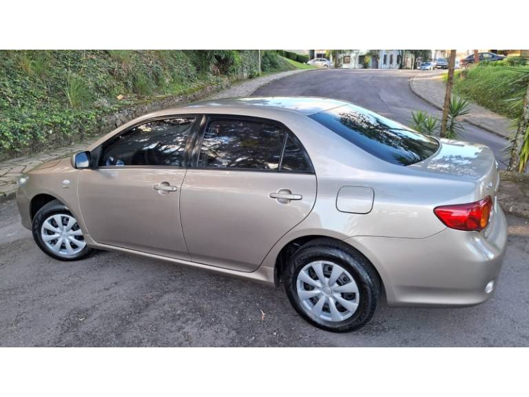 TOYOTA - COROLLA - 2008/2009 - Bege - R$ 53.900,00