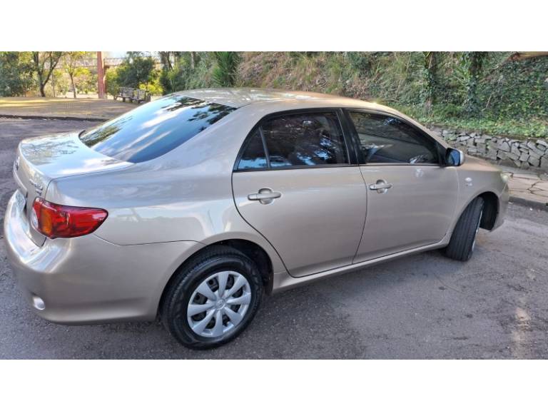 TOYOTA - COROLLA - 2008/2009 - Bege - R$ 53.900,00