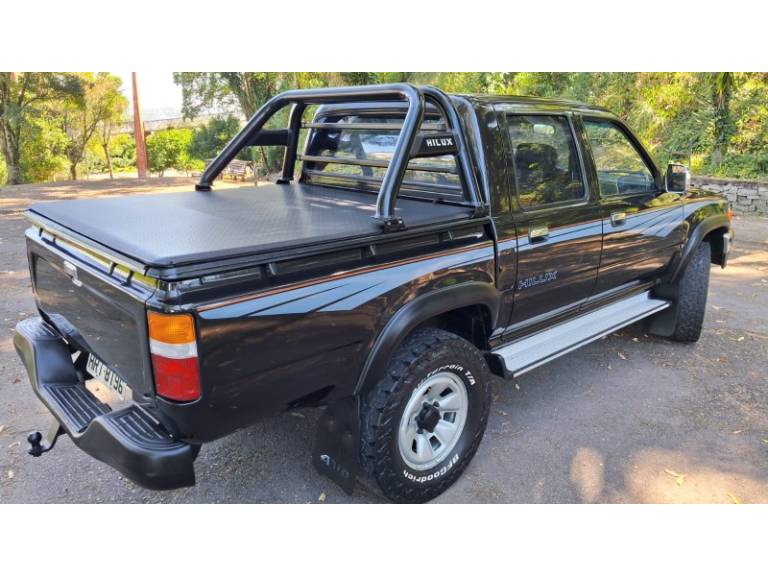 TOYOTA - HILUX - 1999/2000 - Preta - R$ 73.900,00