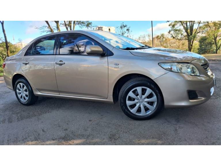 TOYOTA - COROLLA - 2008/2009 - Bege - R$ 53.900,00