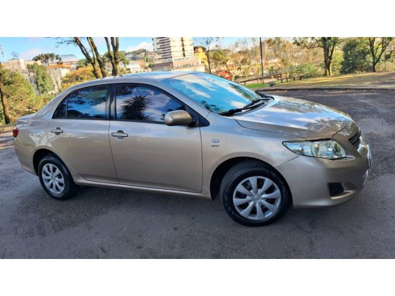 TOYOTA - COROLLA - 2008/2009 - Bege - R$ 53.900,00