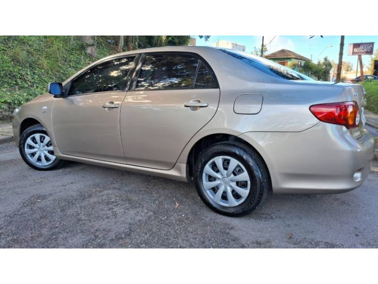TOYOTA - COROLLA - 2008/2009 - Bege - R$ 53.900,00